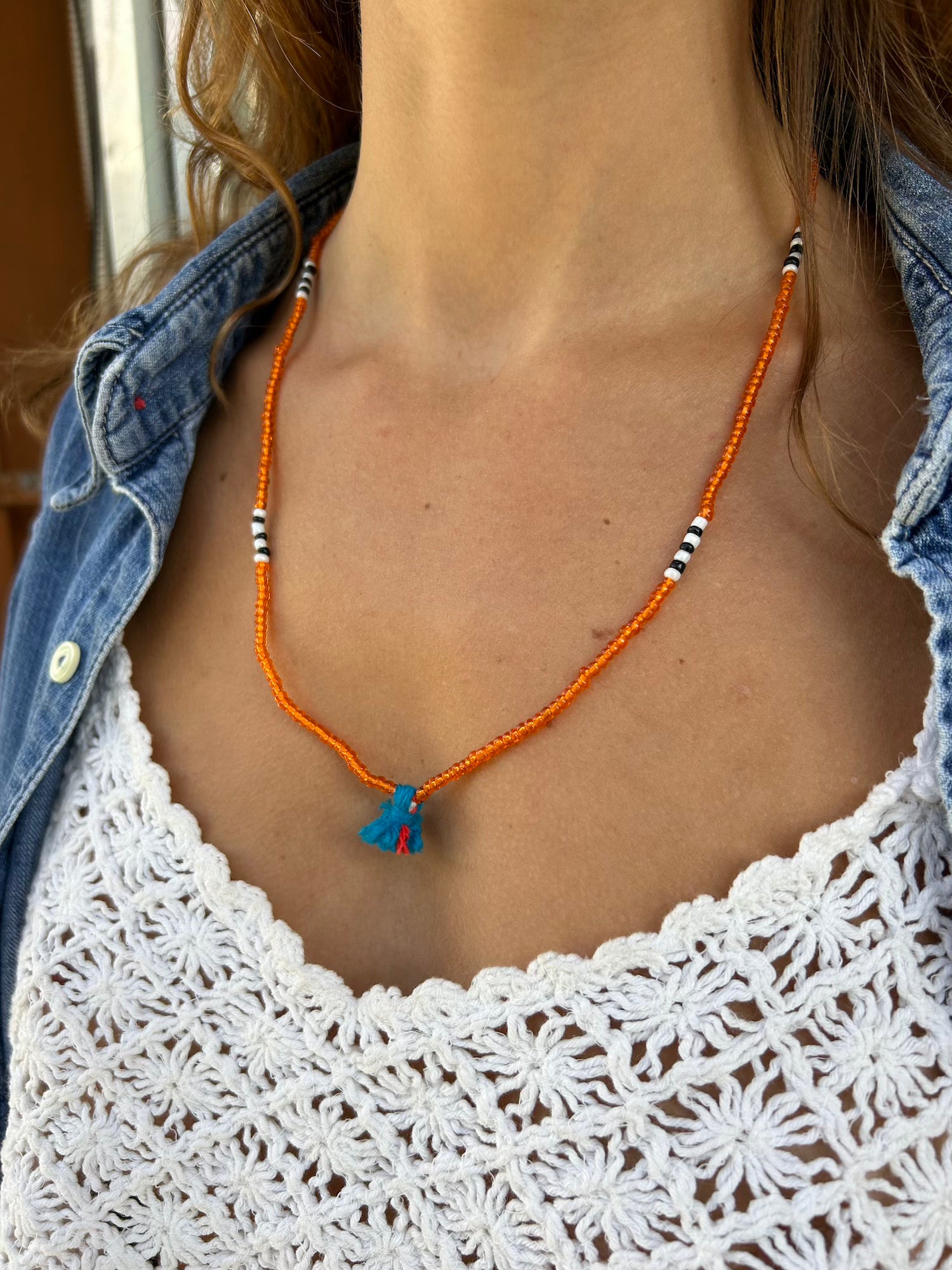 Shanti Necklace - Orange with Blue Pompom