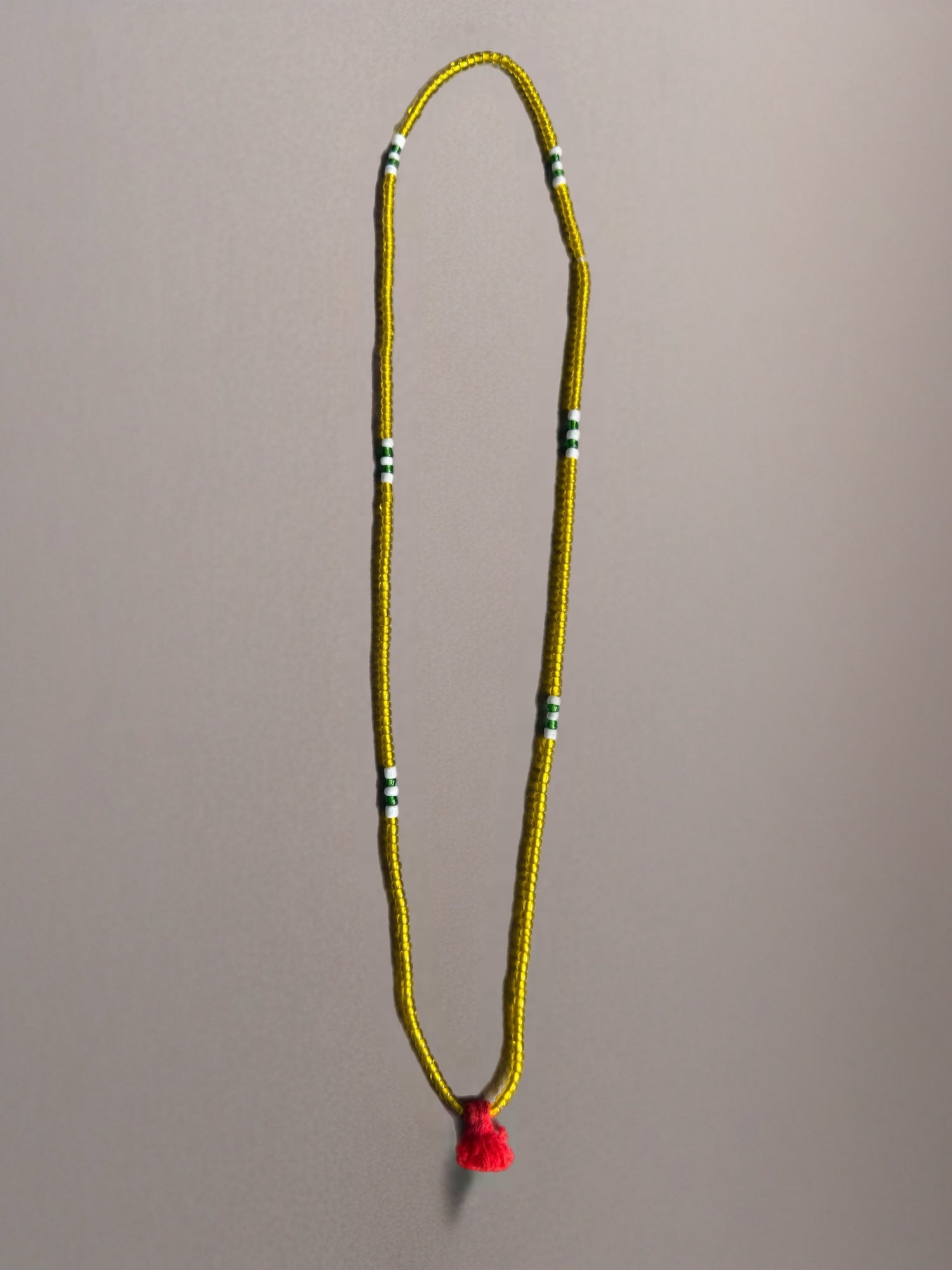 Shanti Necklace - Yellow with Orange Pompom