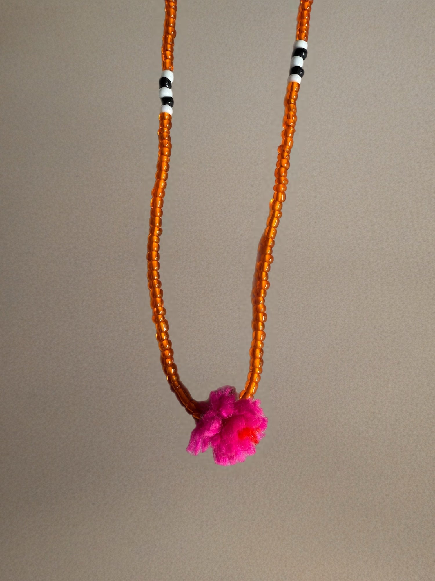 Shanti Necklace - Orange with Fuschia Pompom