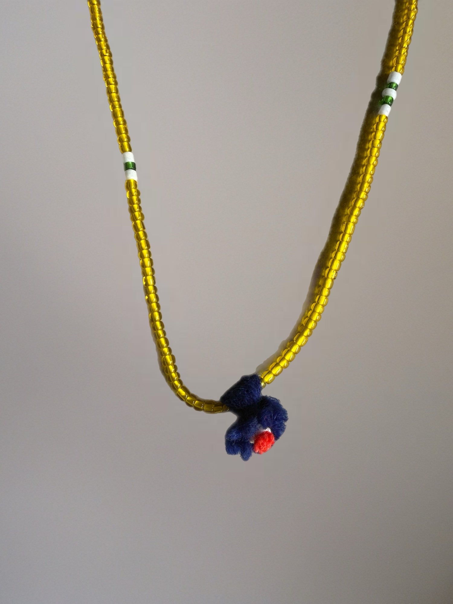 Shanti Necklace - Yellow with Blue Pompom